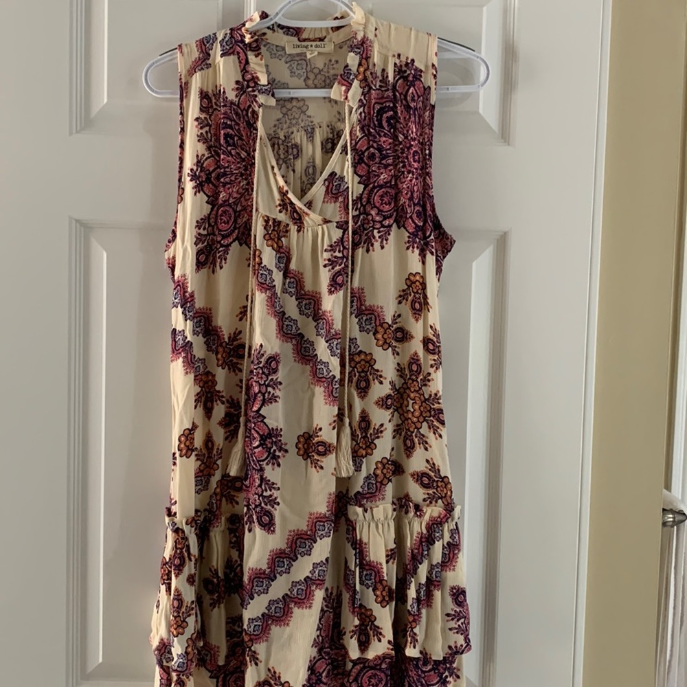 Small cream Living Doll dress with a fun flower pattern